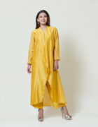 Golden yellow kurta in chanderi with french knot and thread hand embroidery. It comes along with a pair of spun pants.