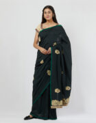 Black soft tussar sari with hand embroidered thread butas and a broad border at the pallu