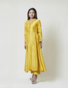 Golden yellow coat collar kurta in chanderi with hand thread and spring embroidery highlighted with glass beads