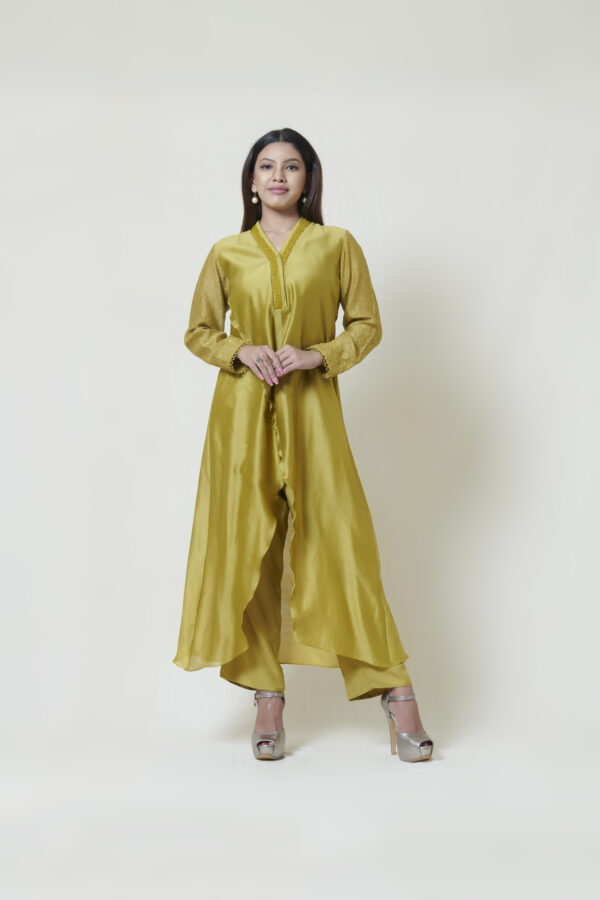 Dark olive crossover kurta in chanderi with tonal thread embroidered neckline. It comes along with a pair of pants.