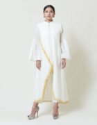 Ivory kora chanderi cross over kurta layered in mulmul with yellow applique and cutwork detailing accentuated with flared pintucked sleeves