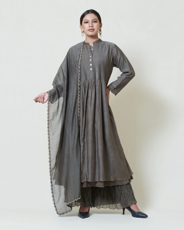 Warm grey kora chanderi kurta layered in mulmul with a pleated bodice detail