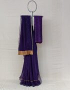 Purple kora chanderi sari with an Organza border with tissue applique and hand thread embroidery details