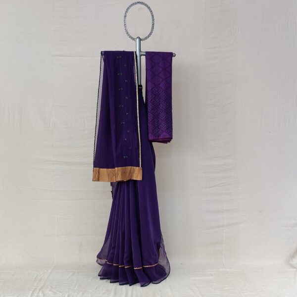 Purple kora chanderi sari with an Organza border with tissue applique and hand thread embroidery details