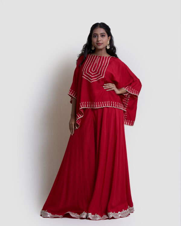 Red spun flare pant with red cape set