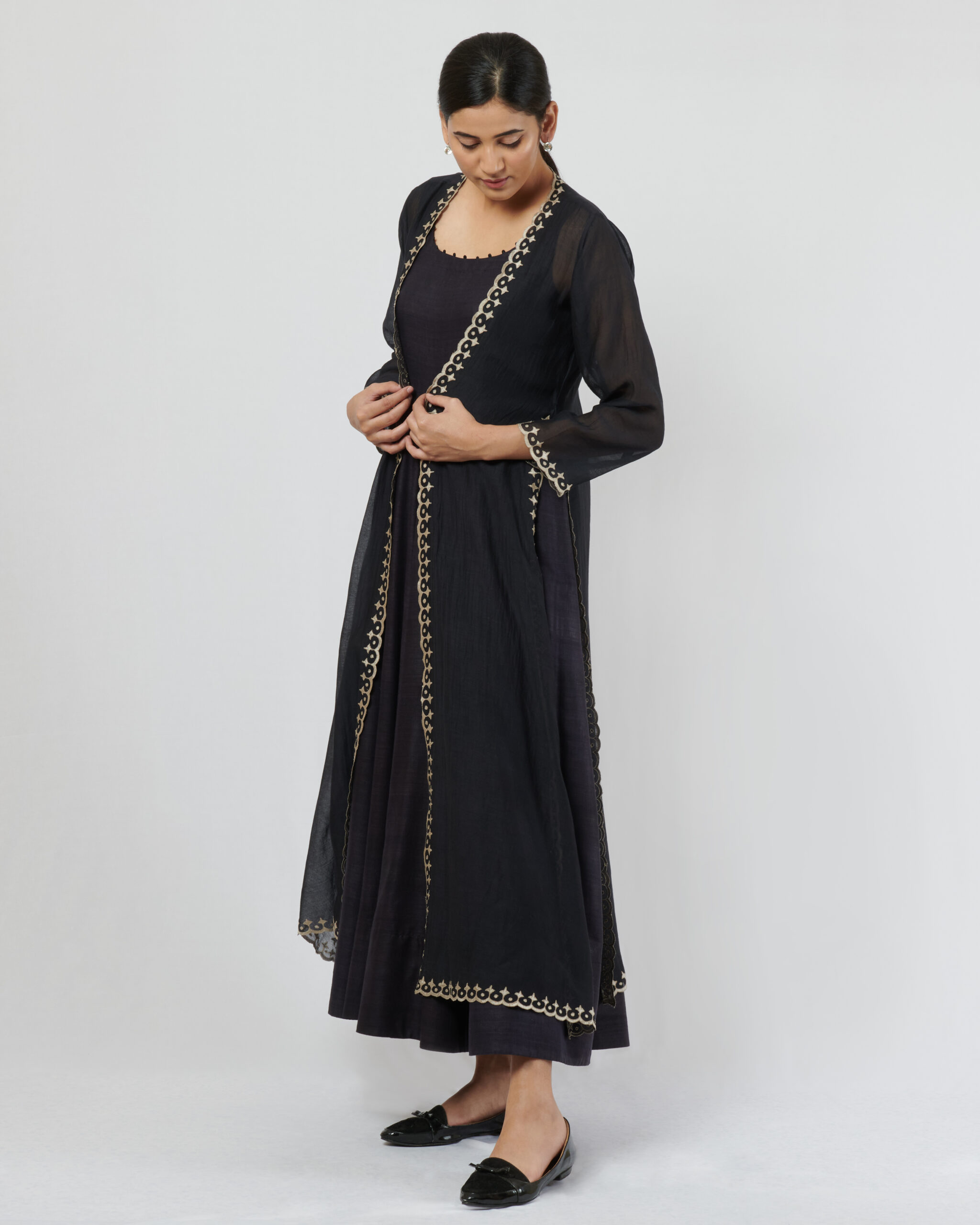 Black long jacket with silver kanchi tissue applique and cutwork detail