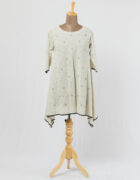 Khadi tunic with spring roses embroidery and highlighted with black applique and cutwork detail hemline and sleeves