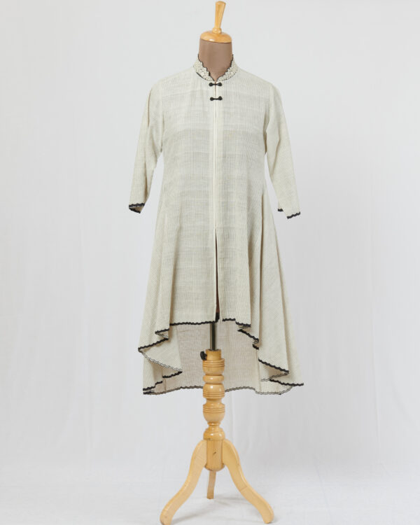Khadi tunic with hand thread embroidered collar highlighted with black applique and cutwork detail hemline and sleeves