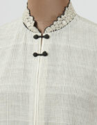Khadi tunic with hand thread embroidered collar highlighted with black applique and cutwork detail hemline and sleeves
