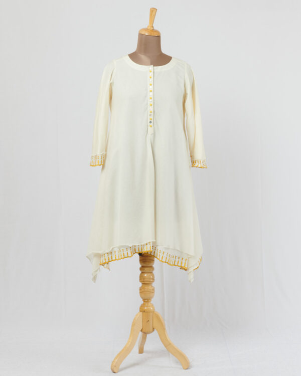 Ivory asymmetric dress layered in mulmul with applique and cutwork detail