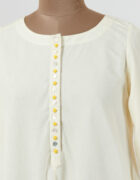 Ivory asymmetric dress layered in mulmul with applique and cutwork detail