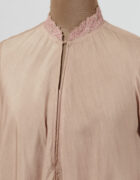 Soft pink tunic with hand embroidered thread collar and cuff details