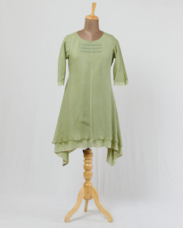Soft mint dress layered in mulmul with applique and cutwork detail