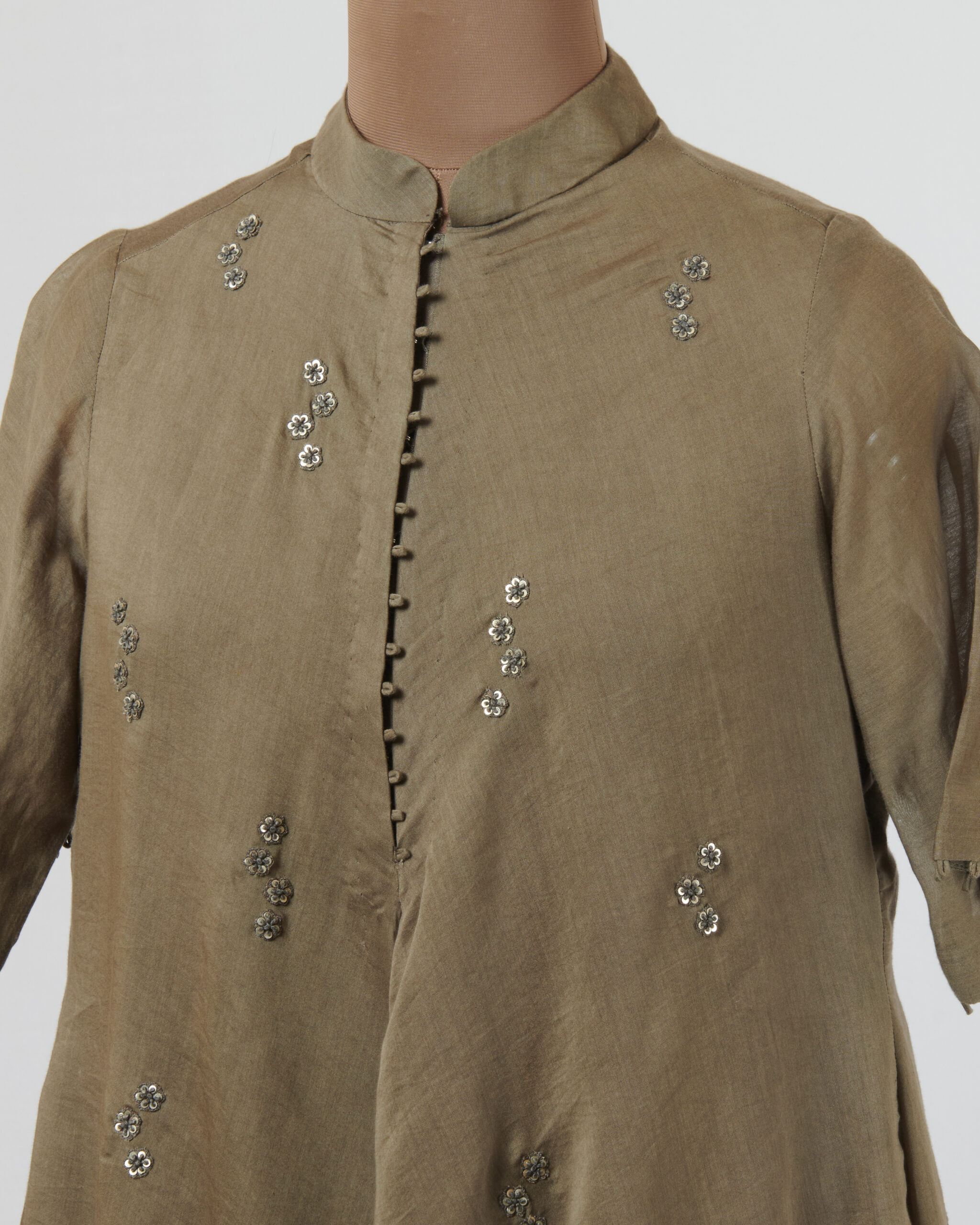 Asymmetric hemline tunic with thread and silver metal sequins embroidery details