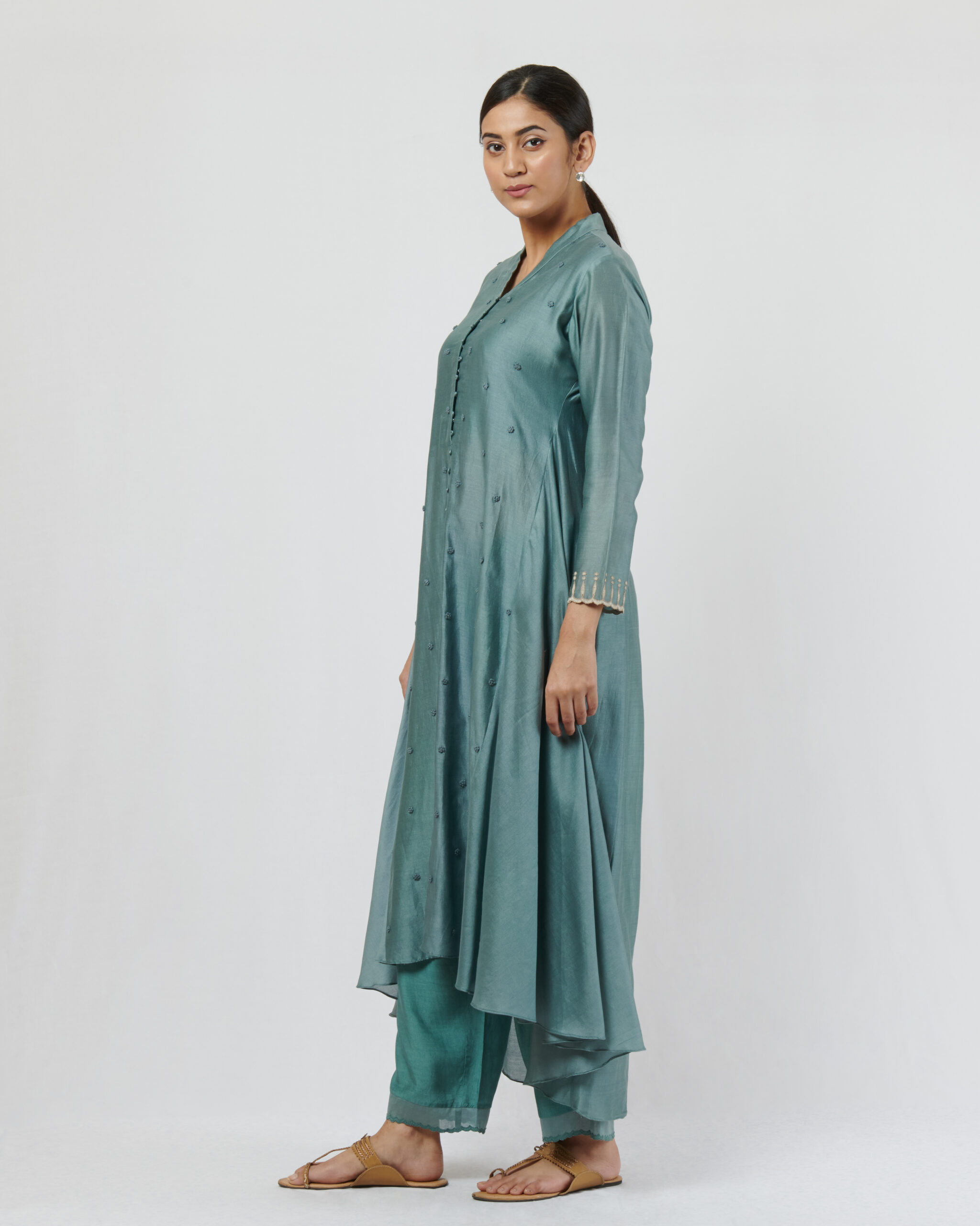 Chanderi kurta adorned with thread french knot hand embroidered butis complemented with straight pants