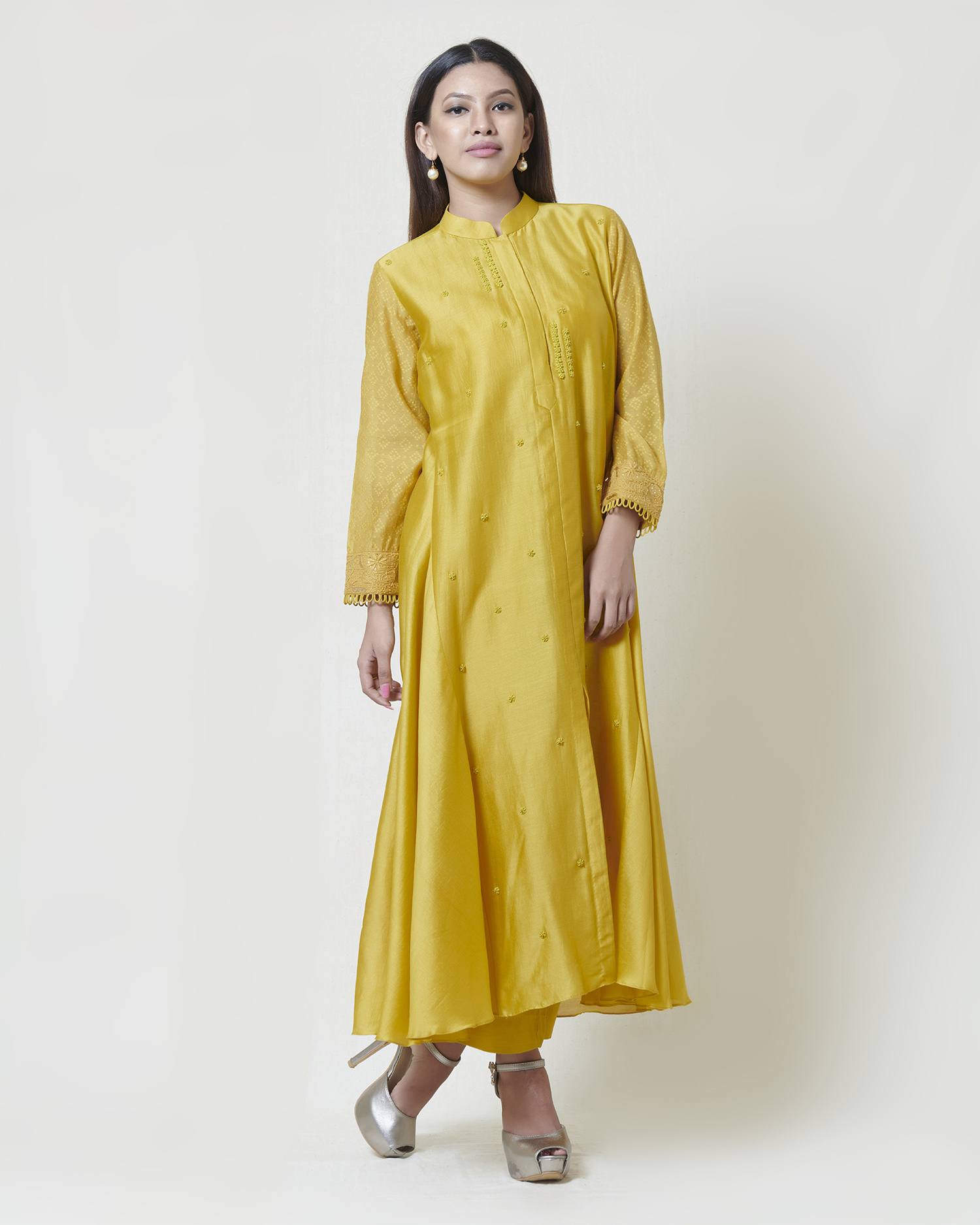 Golden yellow full sleeved centre slit kurta in chanderi with french knot and spring thread hand embroidery highlighted with glass beads