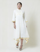 Ivory asymmetric dress layered in mulmul with aplique and cutwork detail