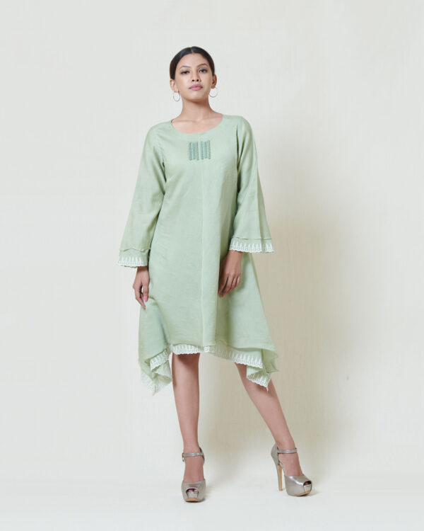 Soft mint dress layered in mulmul with applique and cutwork detail