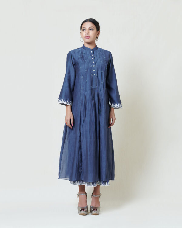 Indigo blue dress layered in mulmul with applique and cutwork detail