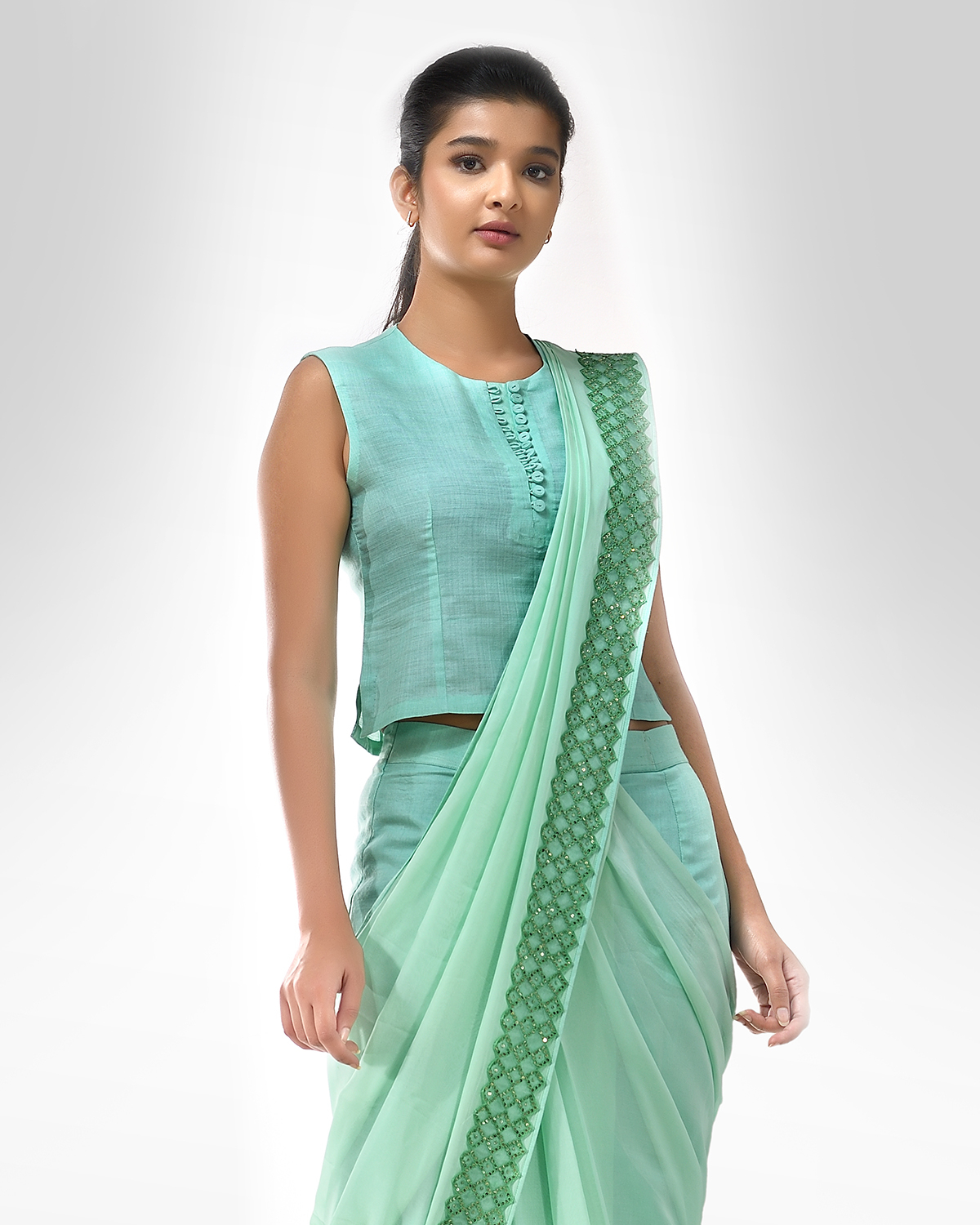 Aqua pre stitched sari with an embroidered border detail