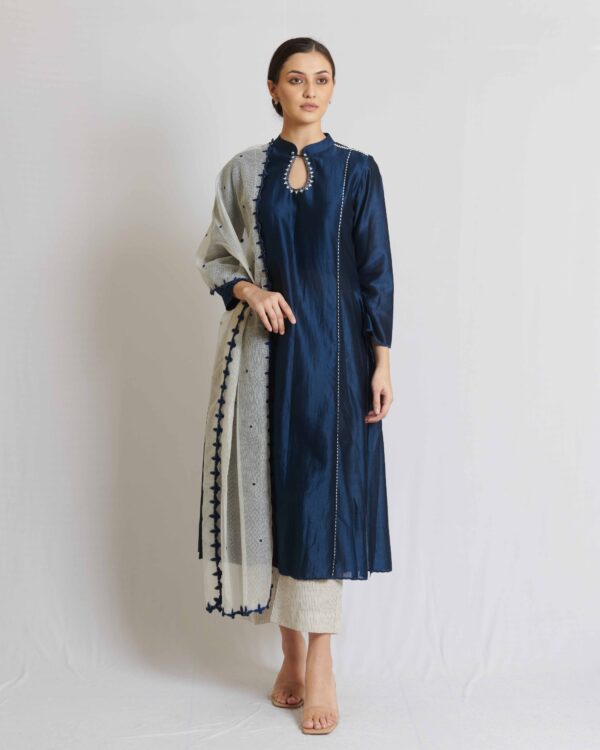 Ivory moonga kota doria dupatta highlighted with blue and dull gold butis all over with a blue hand embroidery border on four sides