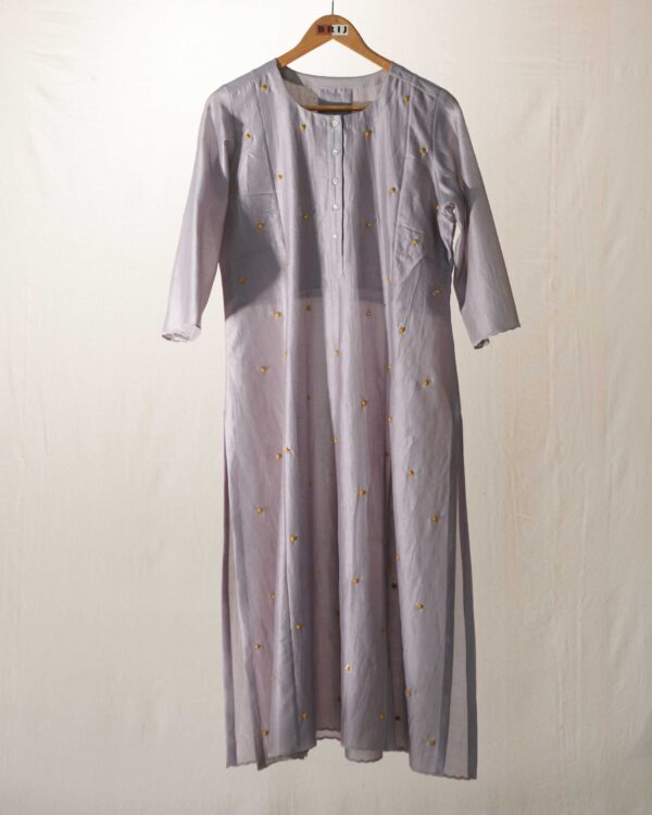 Grey chanderi kurta with yellow hand crafted potlis and scallops applique and cutwork detail