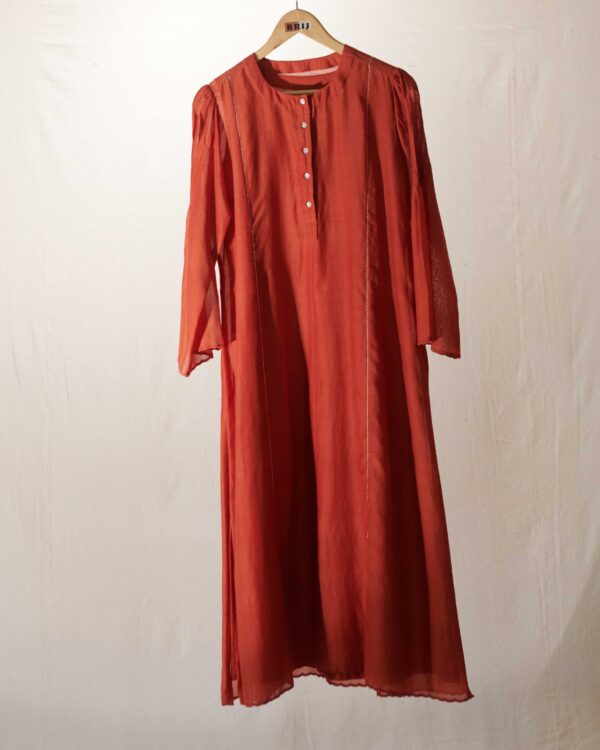 Rust Kora chanderi kurta with ivory thread katha embroidery and scallops applique and cutwork detail