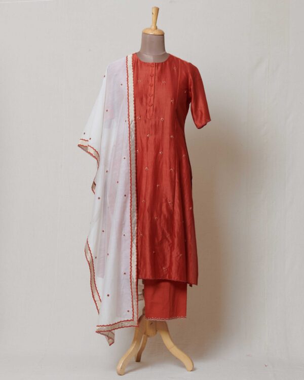 Ivory kora chanderi dupatta with dull gold and rust applique border and hand embroidered rust butis